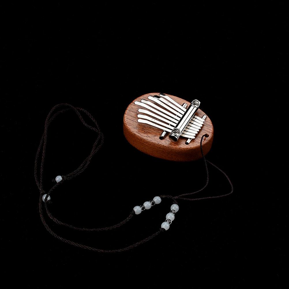 8-клавишная мини-калимба с рем – обзор и цена Musical Instrument Family
